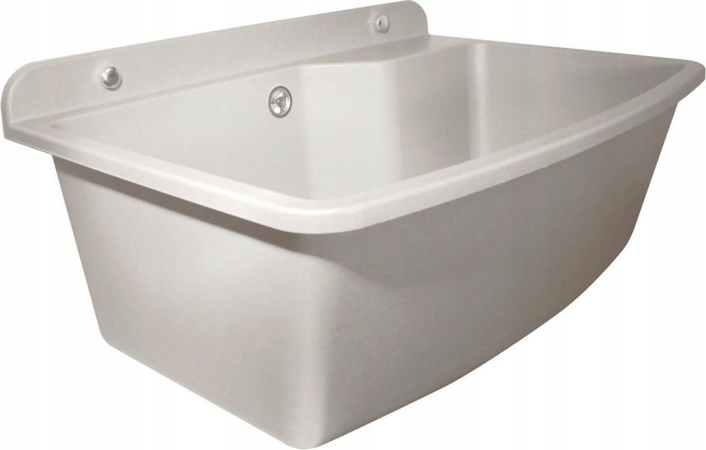 A white sink mounted on a wall.