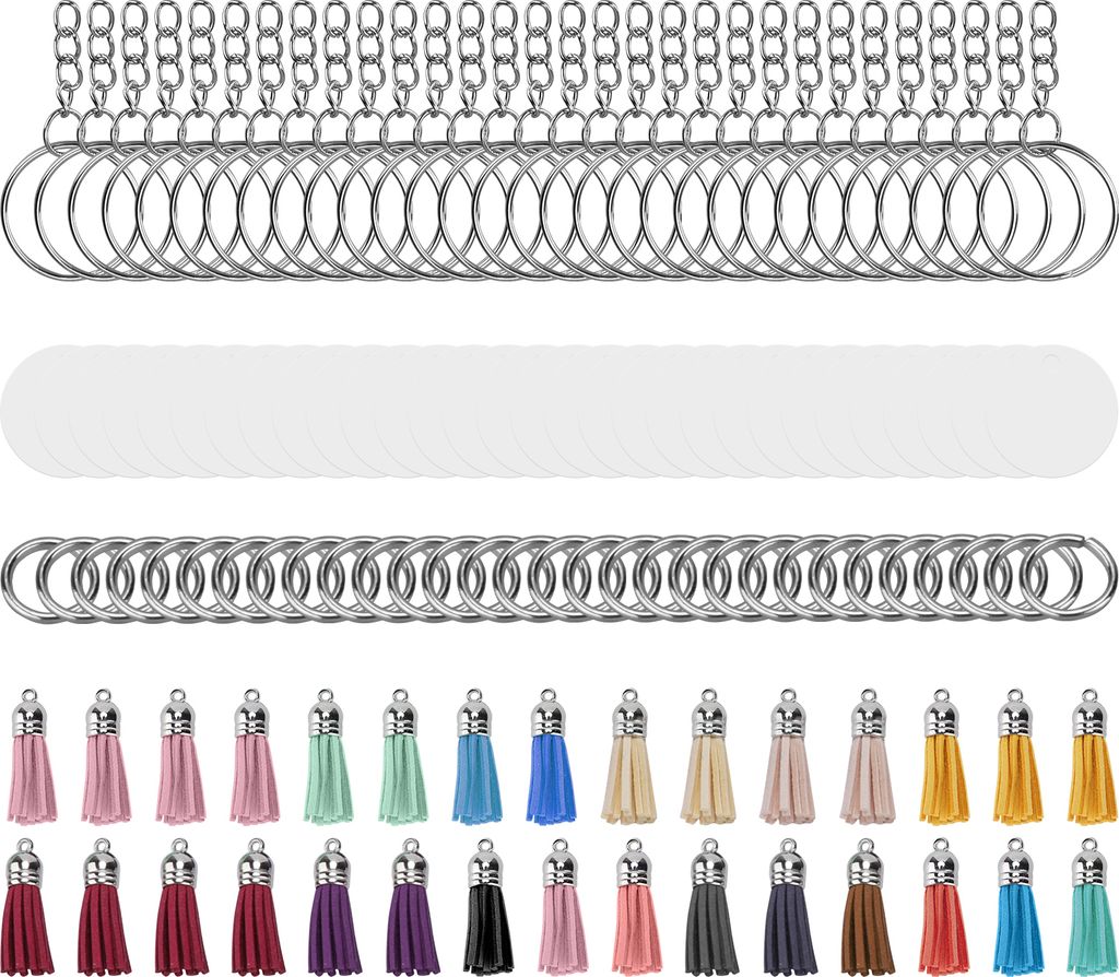 A collection of DIY keychain supplies, including acrylic blanks, jump rings, and colorful tassels, arranged in neat rows.