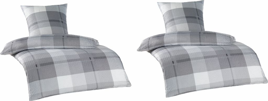 Two sets of bedding with a plaid pattern.