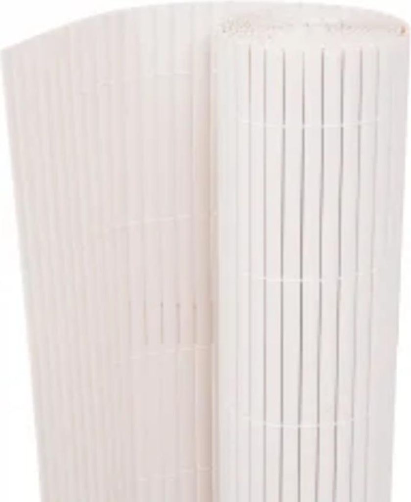 A rolled-up white bamboo fence or screen.