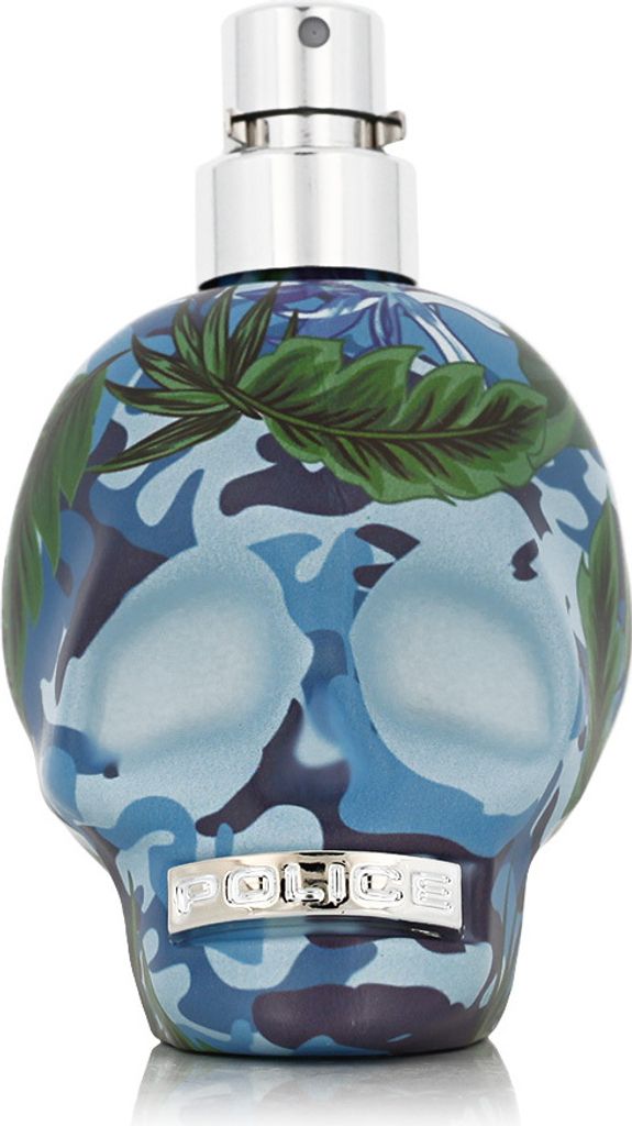 A perfume bottle shaped like a skull with a camouflage and floral pattern.