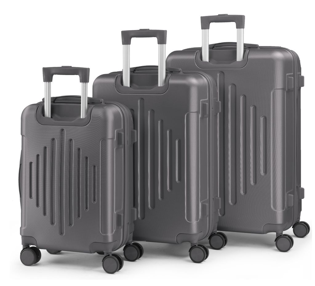 Three gray suitcases of different sizes are arranged in a row against a white background.