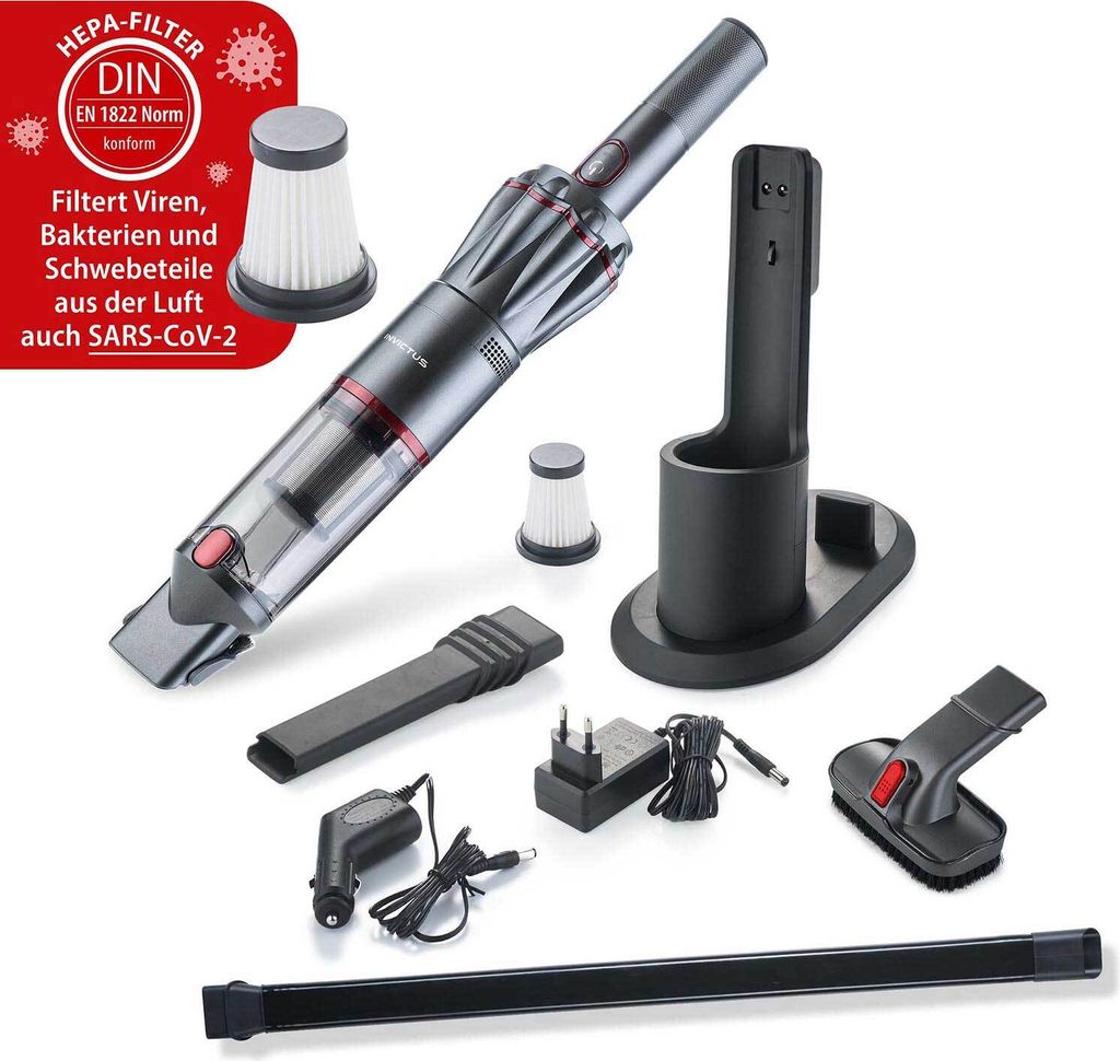 A collection of vacuum cleaner parts and accessories are laid out on a white background.