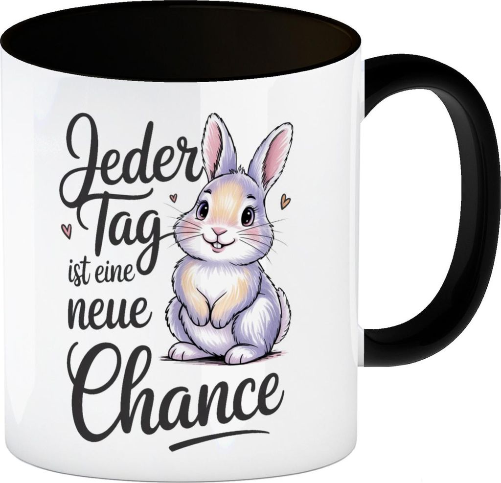 Hase mit Herzen Jeder Tag ist eine neue Chance Spruch Kaffeebecher in schwarz