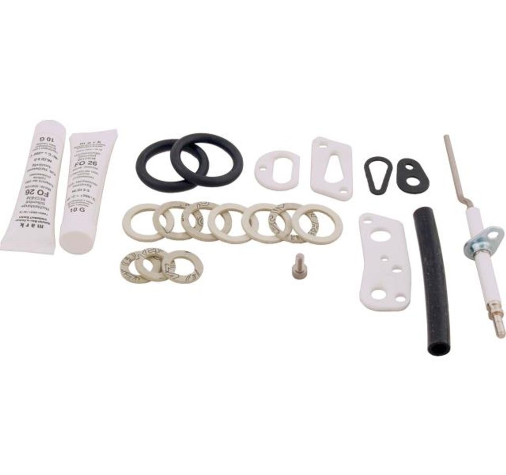 A collection of various parts and small tubes for maintenance.