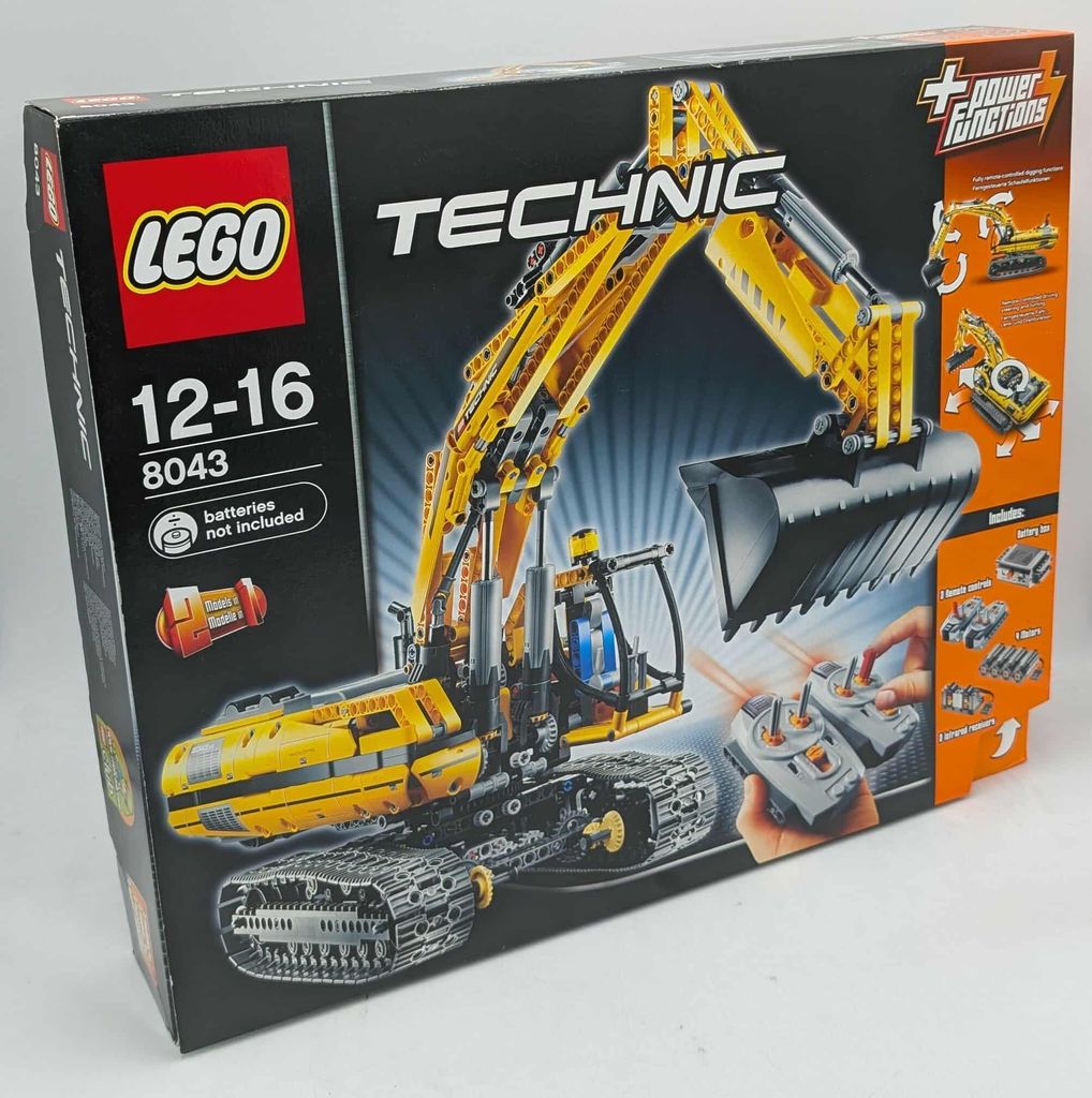 The image shows the box of a LEGO Technic motorized tracked excavator set.