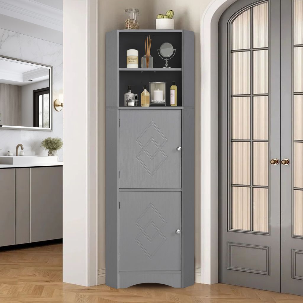 A gray corner cabinet with open shelves and two closed cabinets, placed in a hallway next to a door and a bathroom entrance.