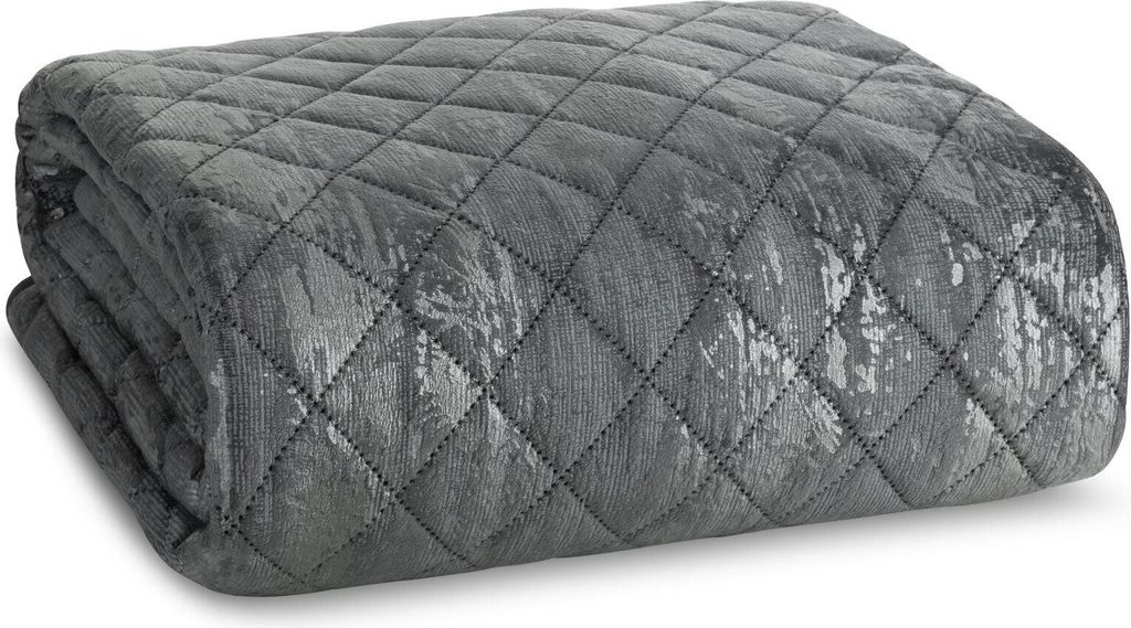 A folded gray quilted blanket with a textured pattern.
