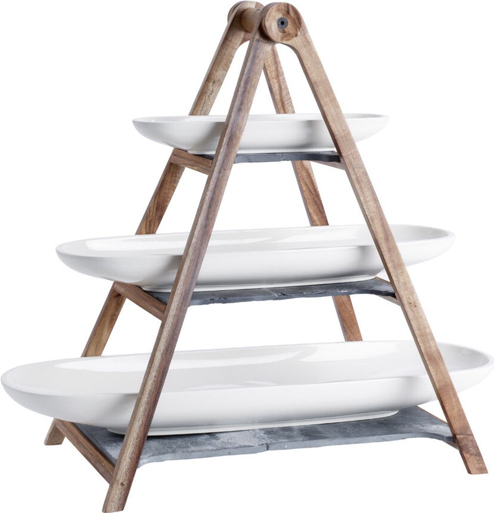 A three-tiered serving stand with white oval platters and a wooden frame.