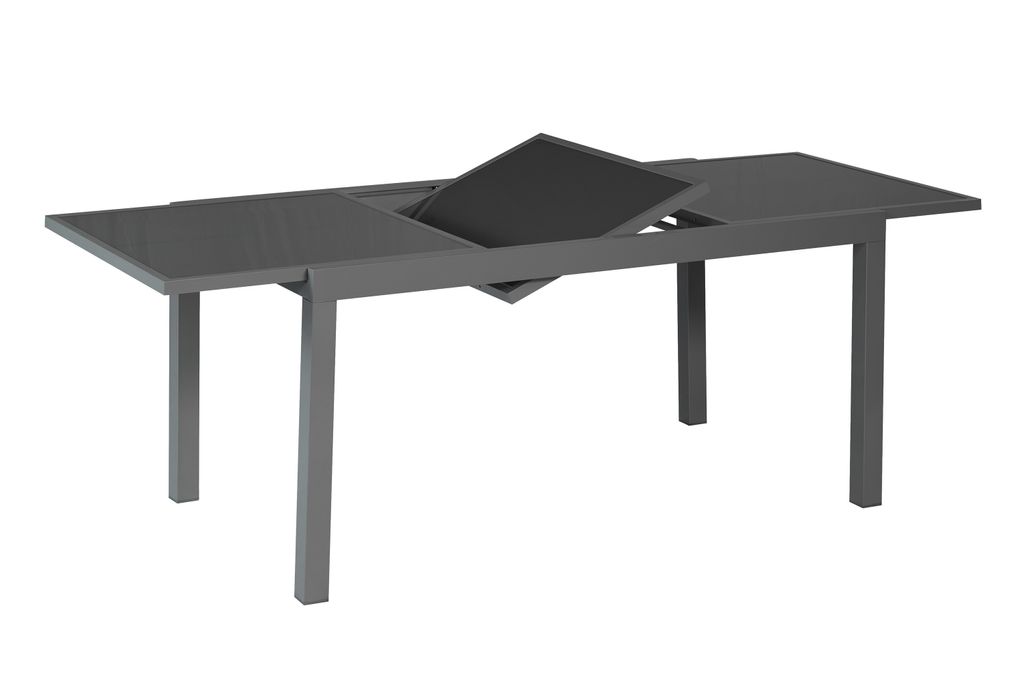 A gray outdoor dining table with a glass top, shown with an extension leaf partially pulled out.