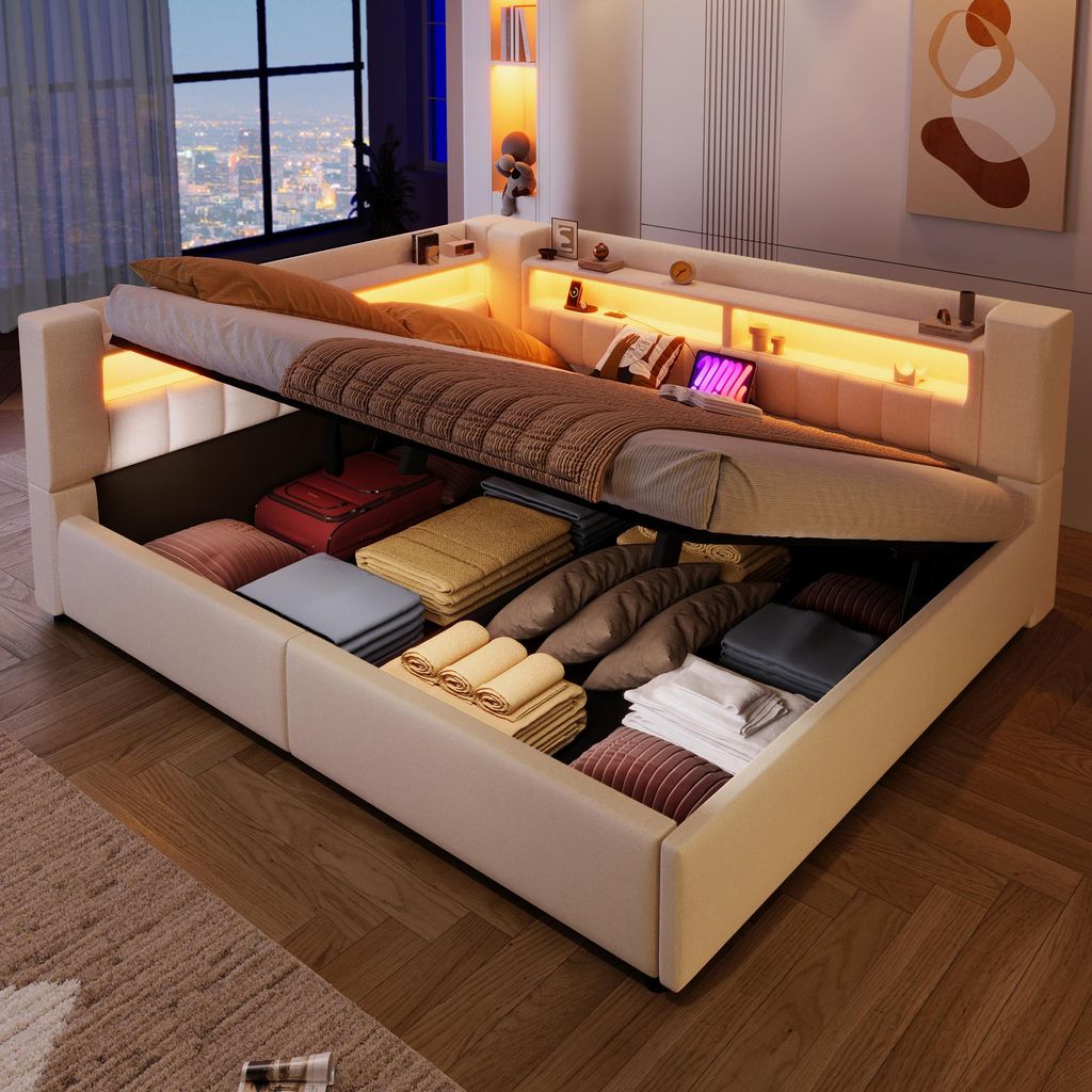 A bed with its storage compartment open, showing neatly folded linens and pillows.