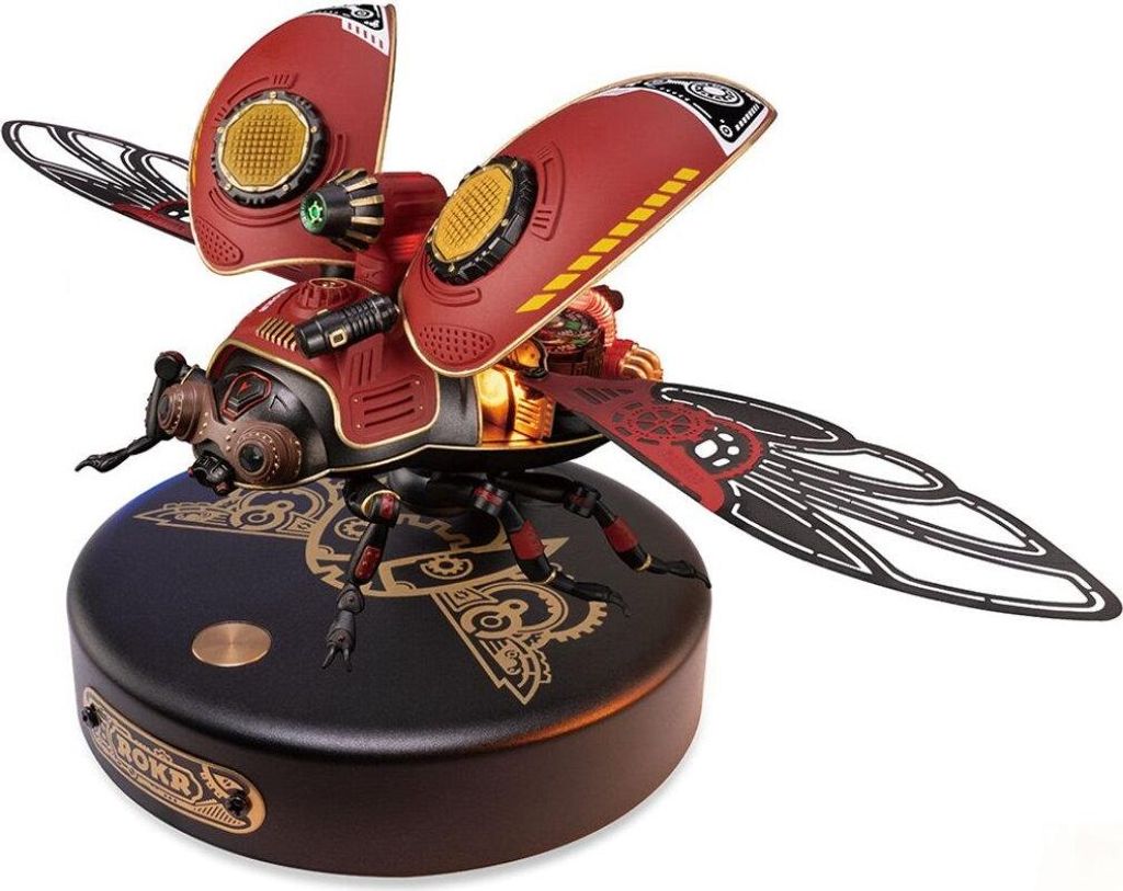 A steampunk-themed mechanical beetle model on a circular base.