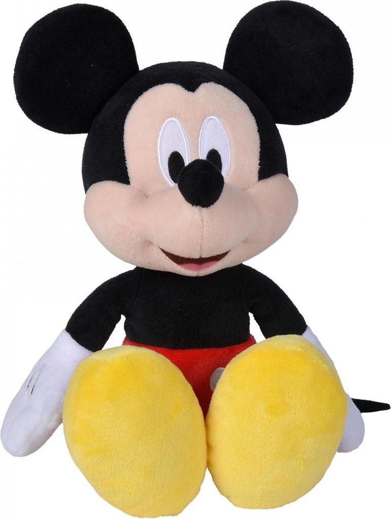 A plush toy of Mickey Mouse sitting down against a white background.