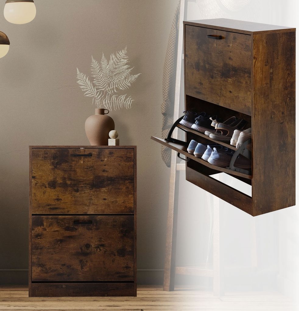 A shoe cabinet with two flip-out drawers is shown in a room setting, with a vase and plant on top of a similar cabinet to the left. The shoe cabinet is open, displaying shoes inside.