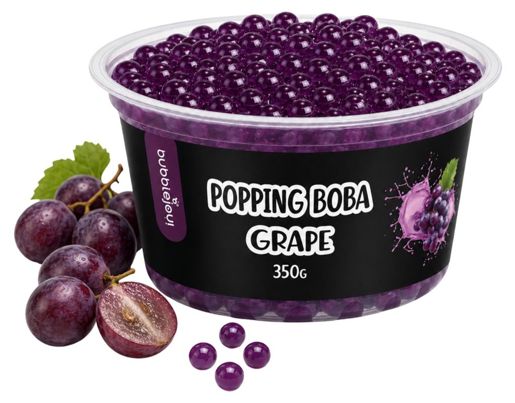 Popping Boba Traube 350g in einer schwarzen Schale mit frischen Weintrauben daneben