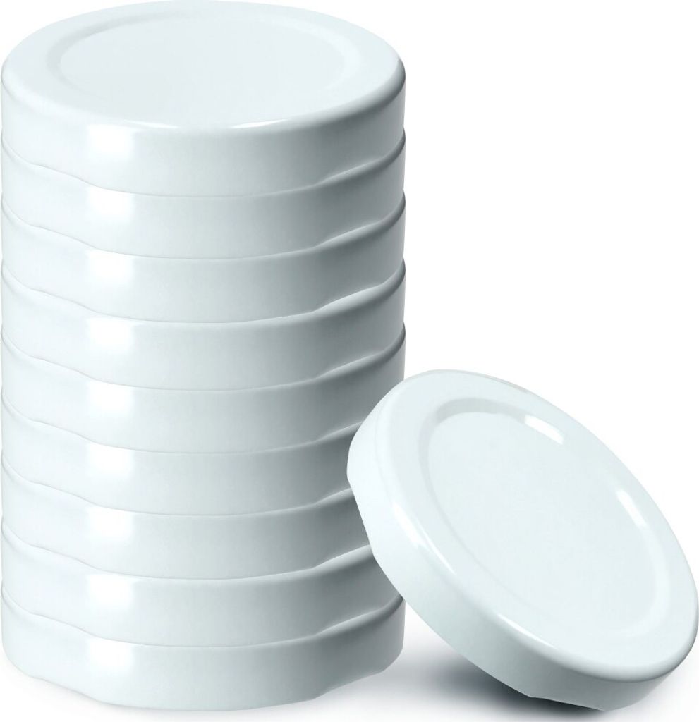 A stack of white jar lids with one lid placed in front of the stack.