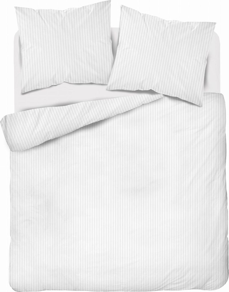 A neatly made bed with white striped bedding and two pillows.