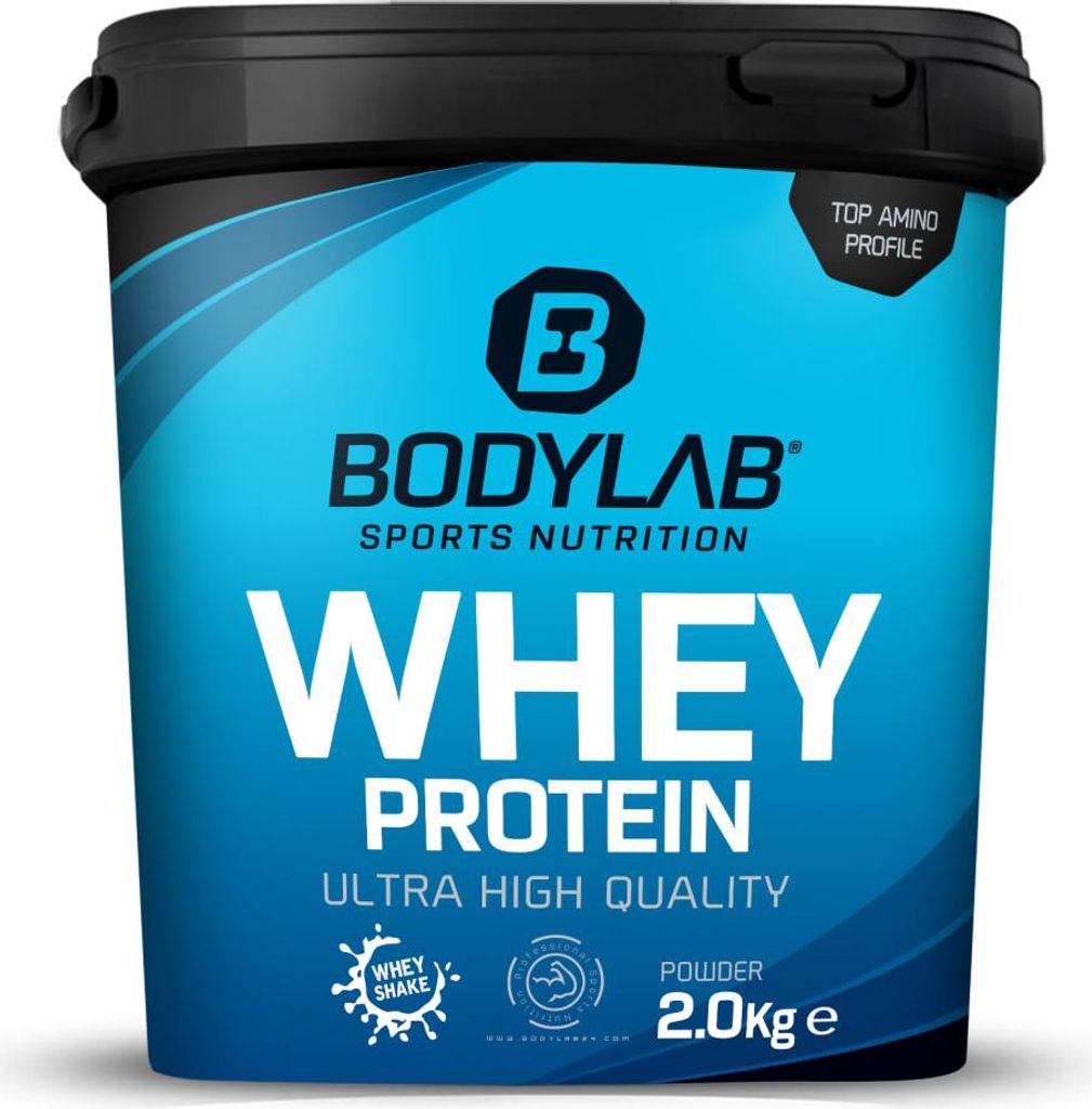 A product shot of a large tub of whey protein powder.