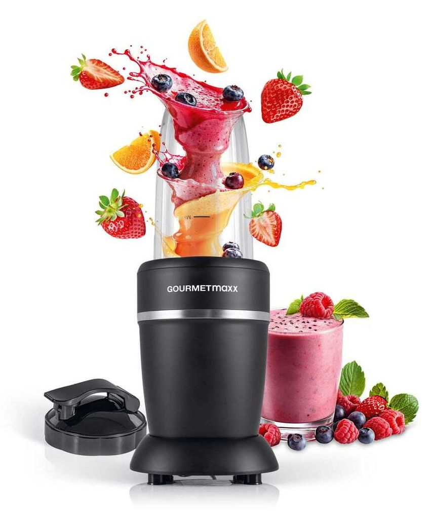 A black GOURMETmaxx nutrition mixer is shown with fruit and smoothie splashes around it, and a glass of smoothie to the side.