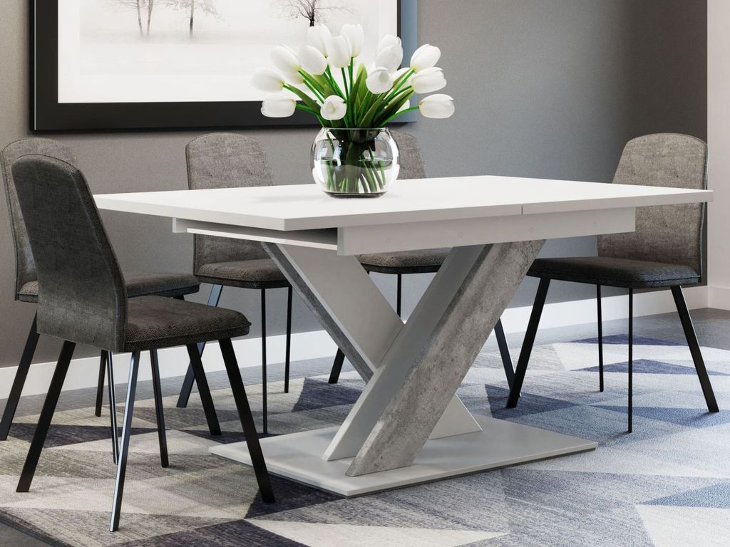 A dining table with chairs in a modern dining room setting.