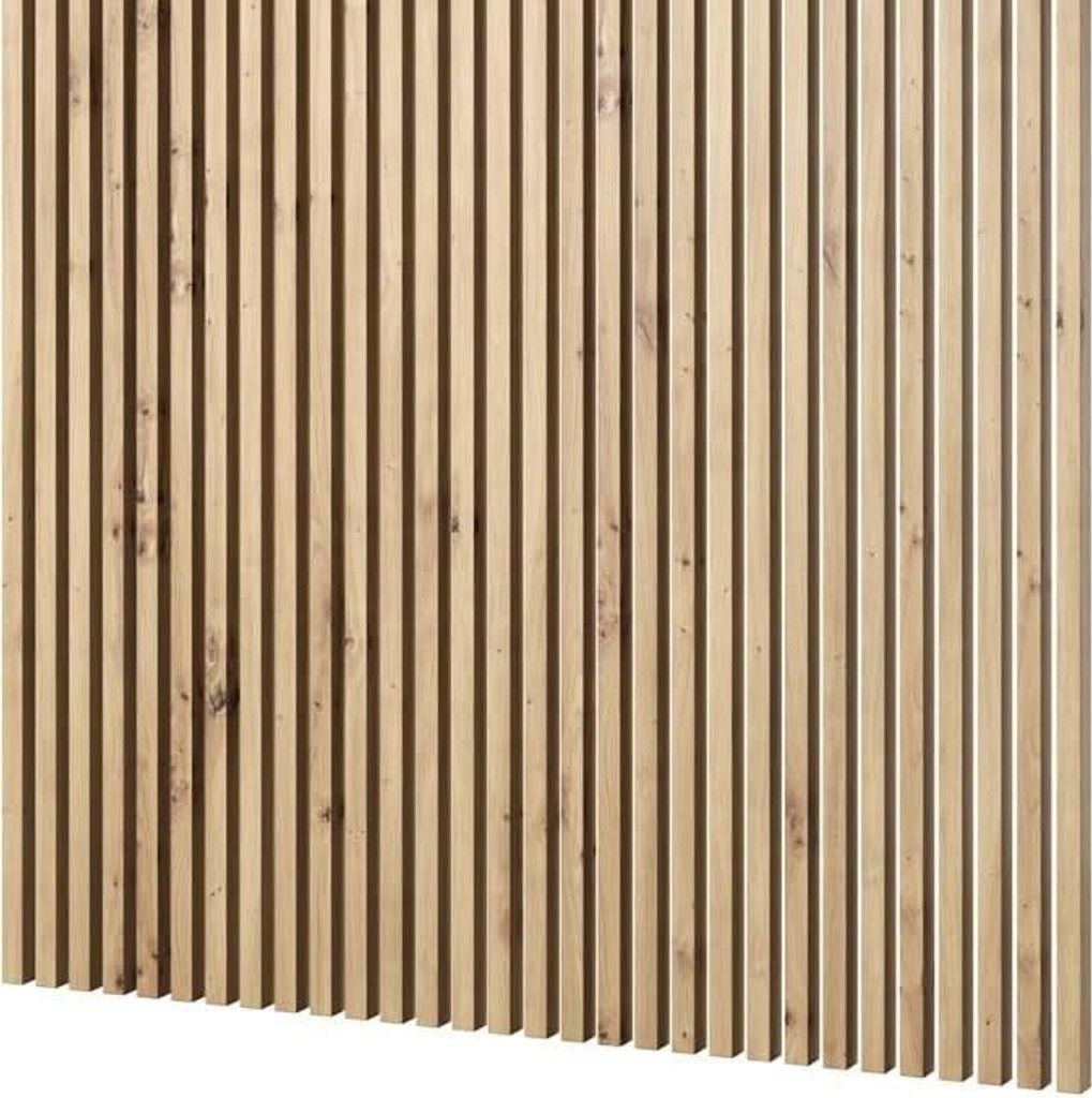 A wall covered with vertical wooden slats.