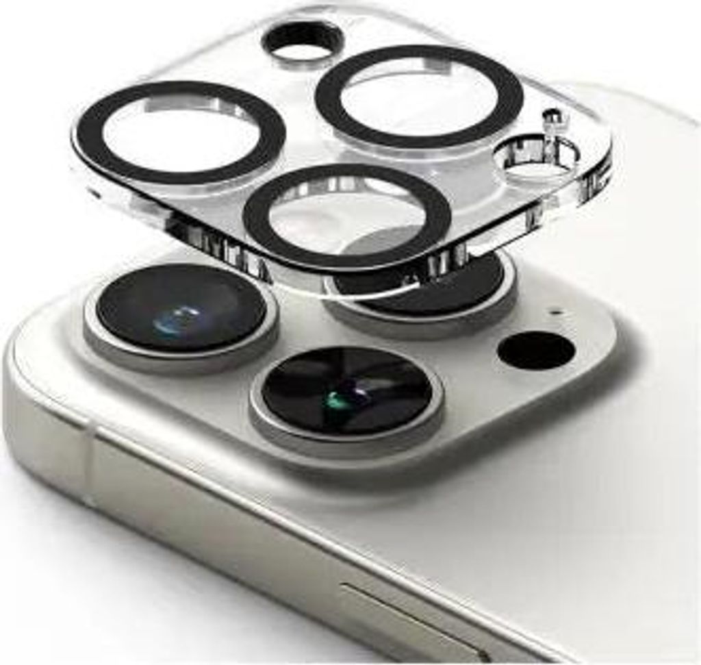 A close-up view of a camera lens protector being placed onto a smartphone.
