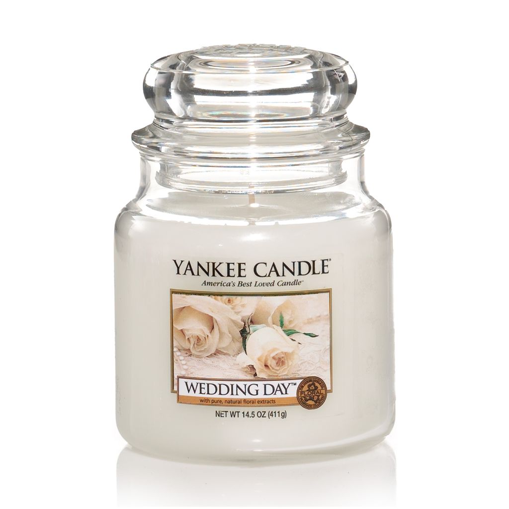 A Yankee Candle "Wedding Day" scented candle in a clear glass jar with a clear glass lid, set against a white background.