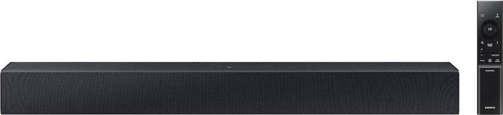 A black soundbar and its remote control are displayed against a white background.