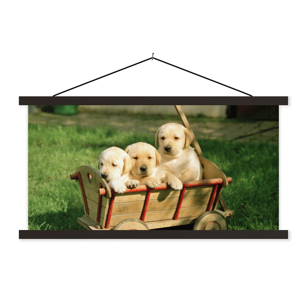 MuchoWow Textilposter Drei entzückende Golden Retriever Welpen in einem Wagen 120x60 cm mit schwarzem Rahmen - Dekoration Schlafzimmer