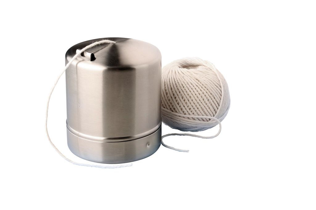 A stainless steel twine dispenser and a ball of twine are shown against a white background.