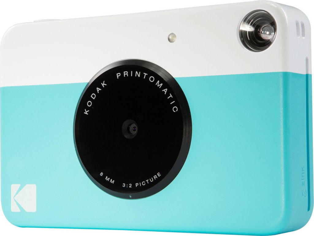A close-up studio shot of a Kodak Printomatic instant camera.