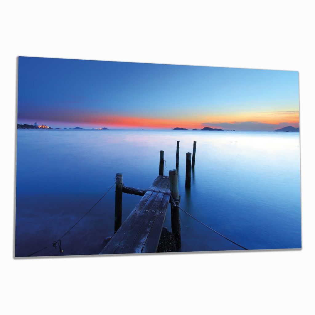 Wallario Herdabdeckplatte aus Glas, Größe 80 x 52 cm 1-teilig, Motiv Steg im Wasser - Abendstimmung am Meer