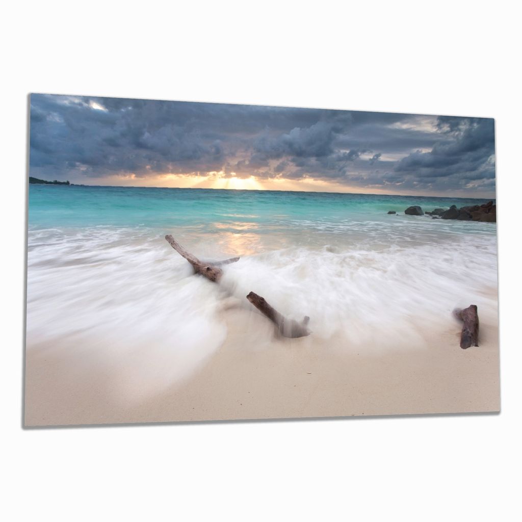 Wallario Herdabdeckplatte aus Glas, Größe 80 x 52 cm 1-teilig, Motiv Wellen am Strand bei Sonnenuntergang