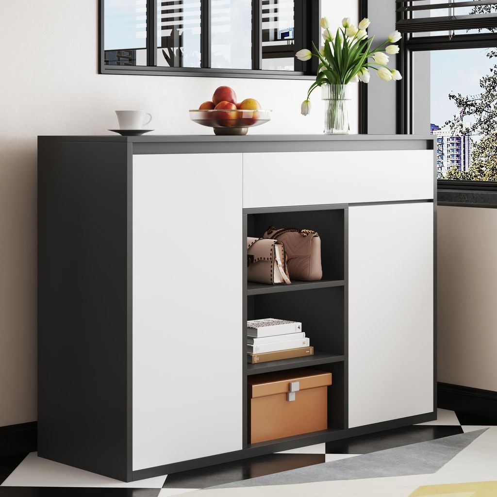 A modern shoe cabinet with two doors and an open shelving unit, displaying handbags, books, and a decorative box.