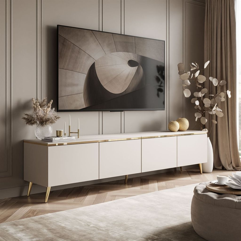 A modern living room with a TV cabinet and a large television mounted on the wall.