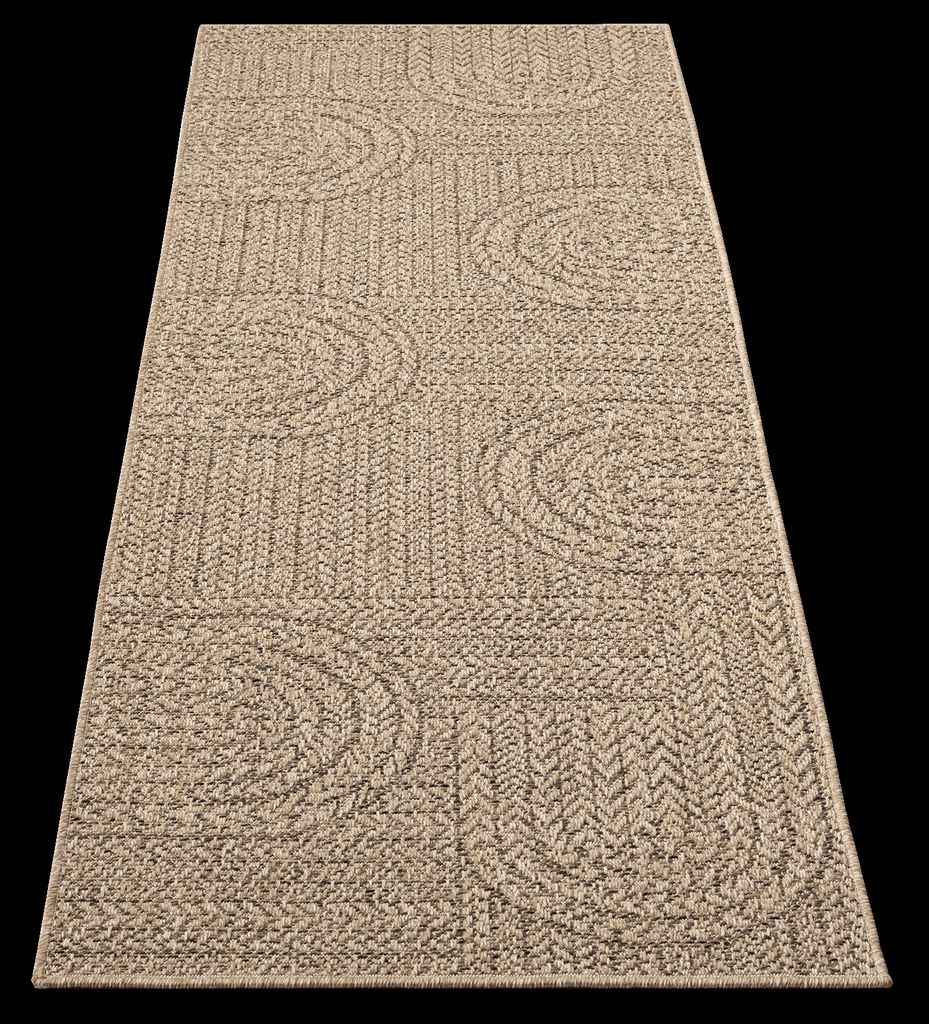 A rug with a patterned texture is shown from a diagonal angle against a black background.