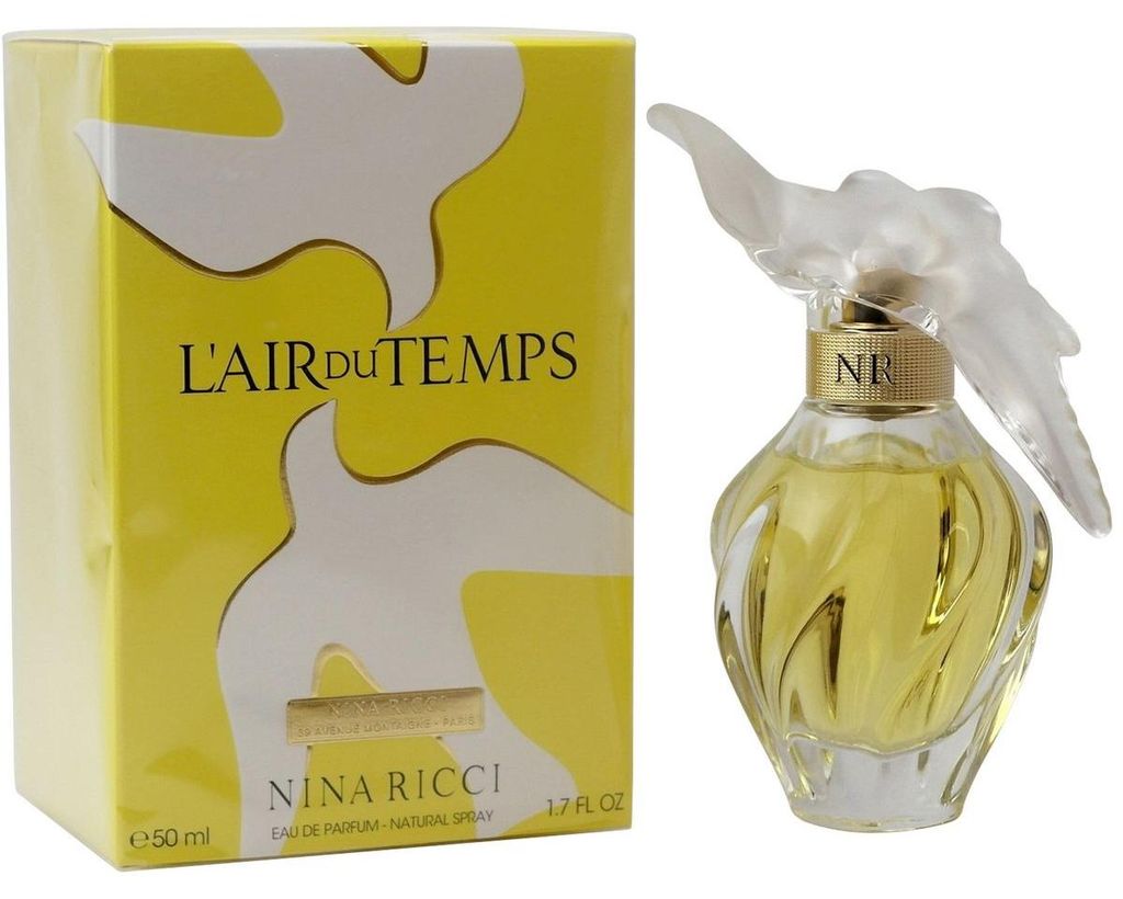 Eleganter Glasflakon mit geschwungenem Design und mattem Deckel in Form zweier Tauben, daneben gelbe Verpackung mit Taubenmotiv und Aufschrift „L’Air du Temps – Nina Ricci“.