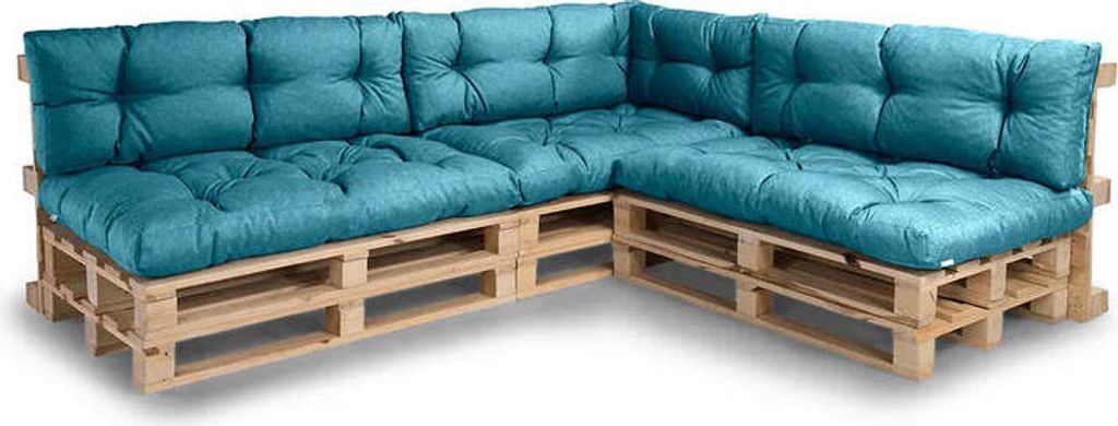 A sectional sofa made from wooden pallets with turquoise cushions.
