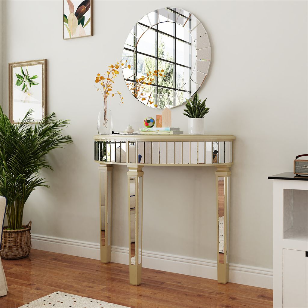 A mirrored console table with decorative items and plants in a room.