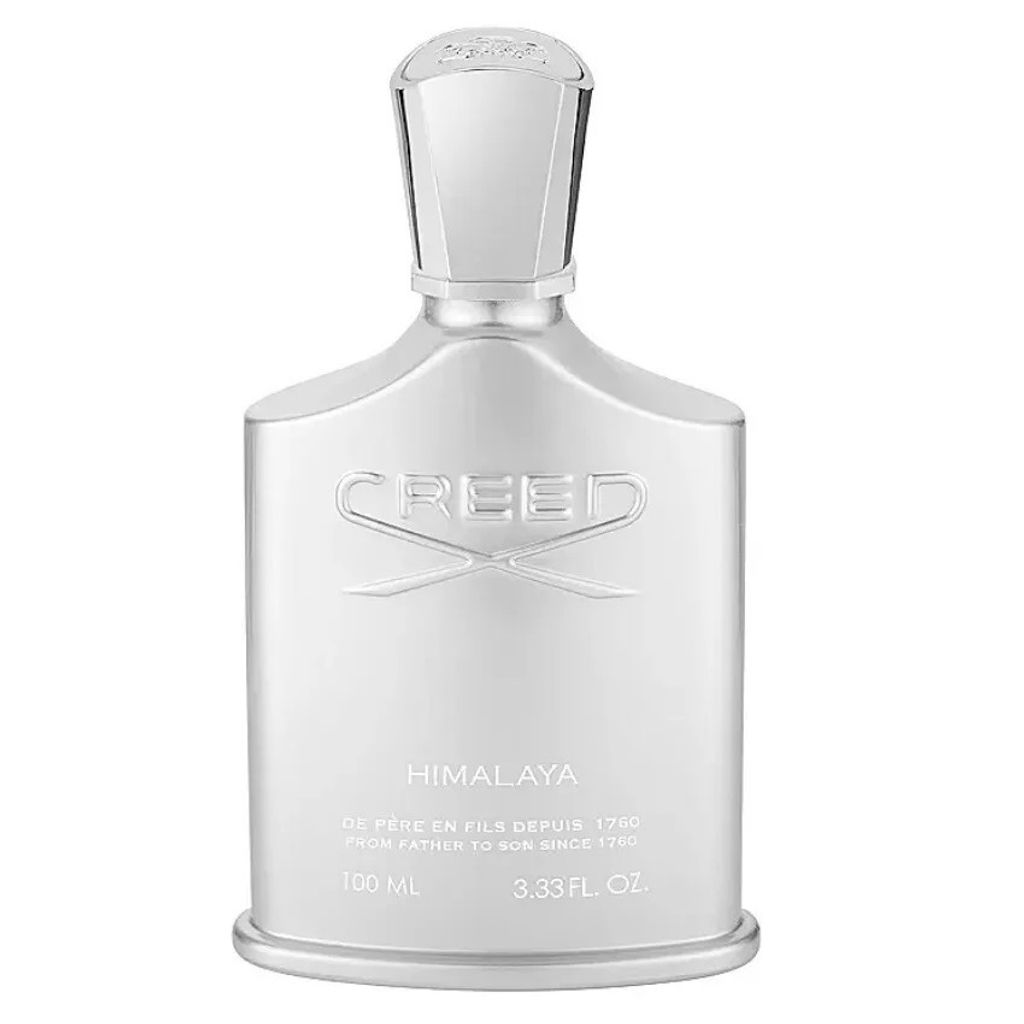 A studio shot of a silver Creed Himalaya Eau de Parfum bottle.