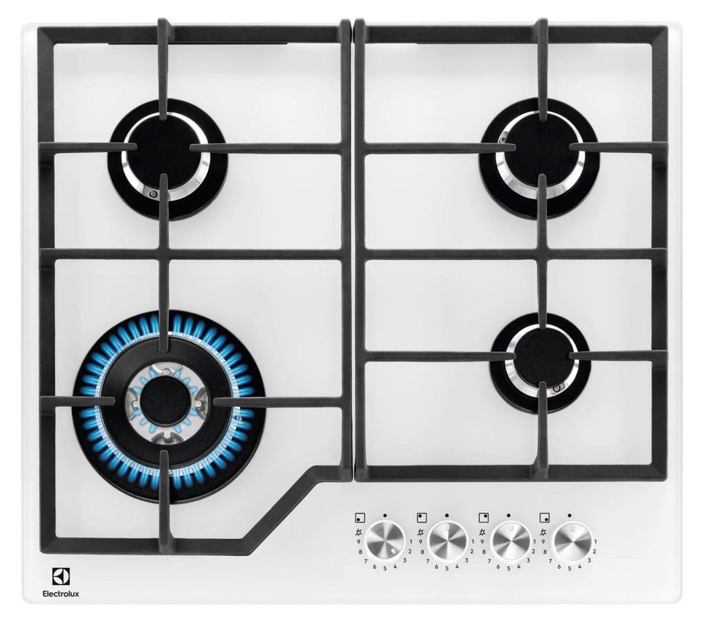 A top-down view of a white gas stovetop with four burners, one of which is lit with blue flames.