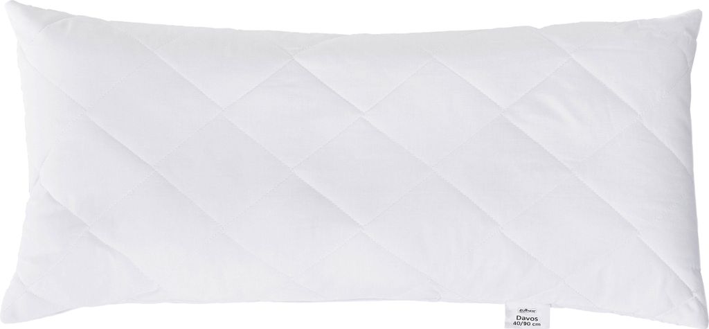 A white quilted pillow on a white background.