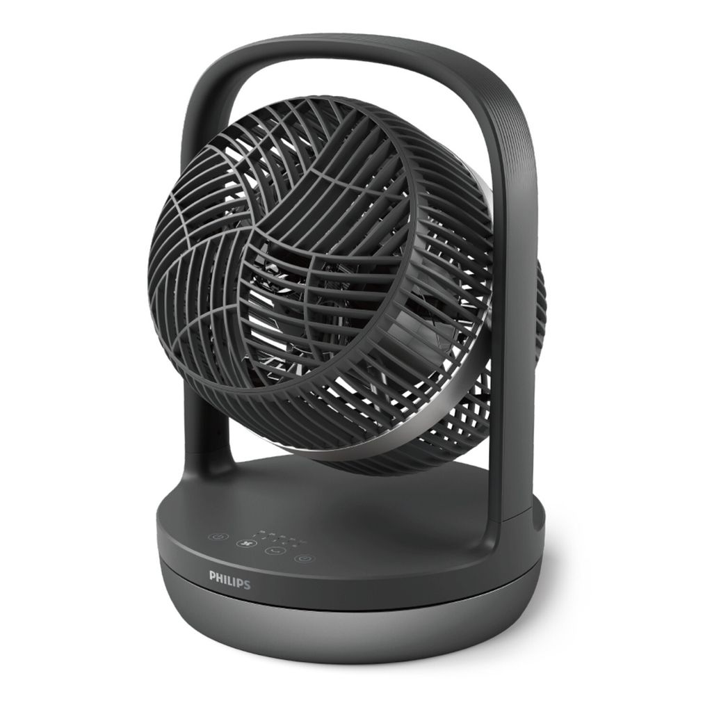 A black Philips table fan on a white background.