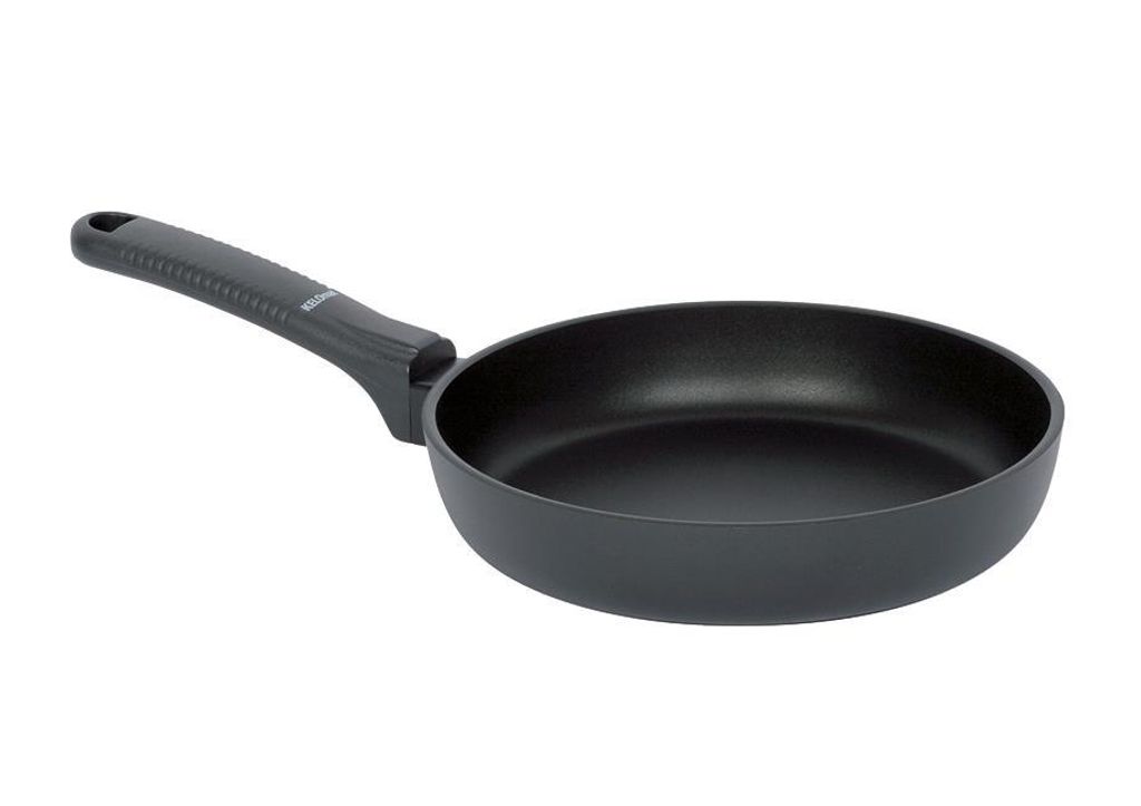 A black frying pan with a black handle is shown against a white background.