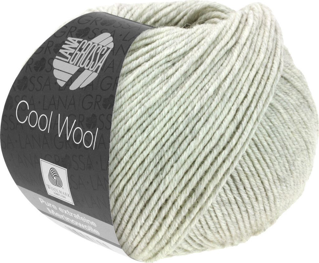 A ball of light gray melange yarn with a dark gray label.