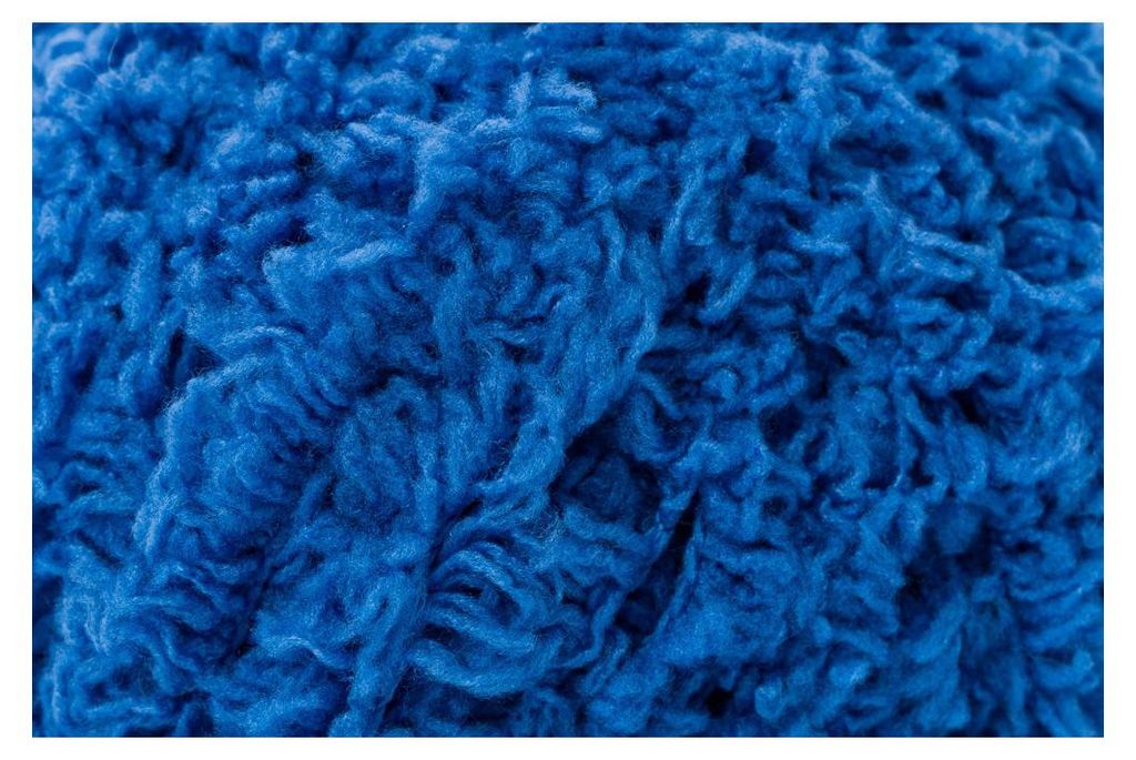 A close-up view of blue yarn.
