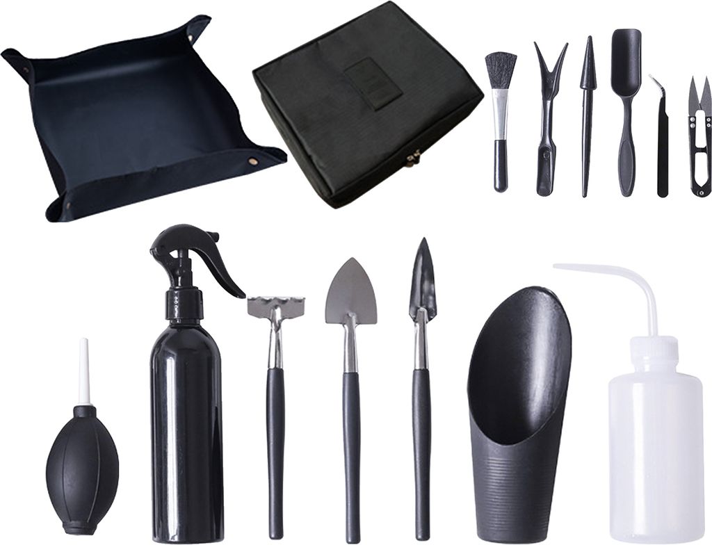 A collection of gardening tools for planting and care, including a tray, case, various hand tools, and spray bottles.