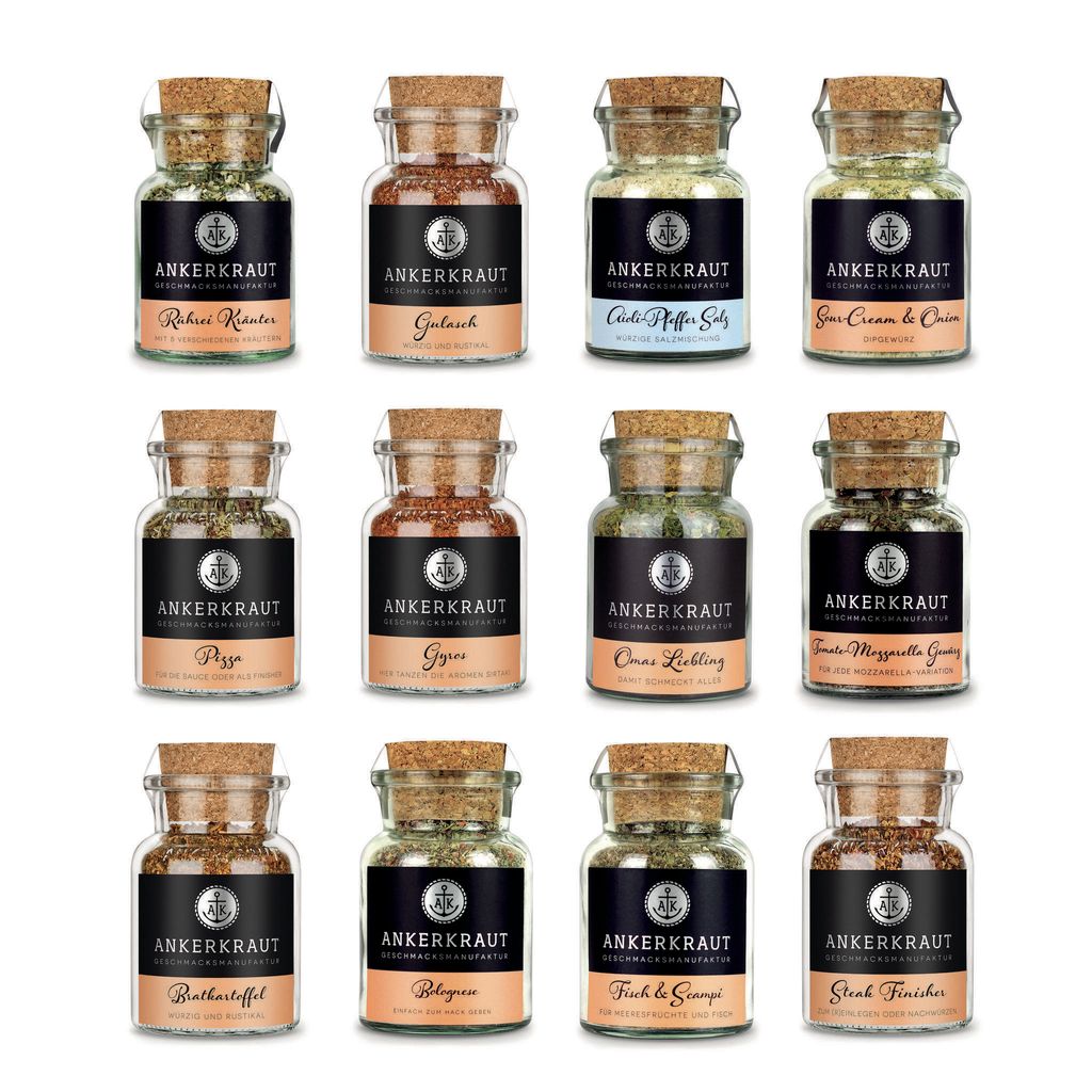 A grid of twelve small glass spice jars with cork stoppers, each labeled with the brand 'ANKERKRAUT' and the name of the spice blend.