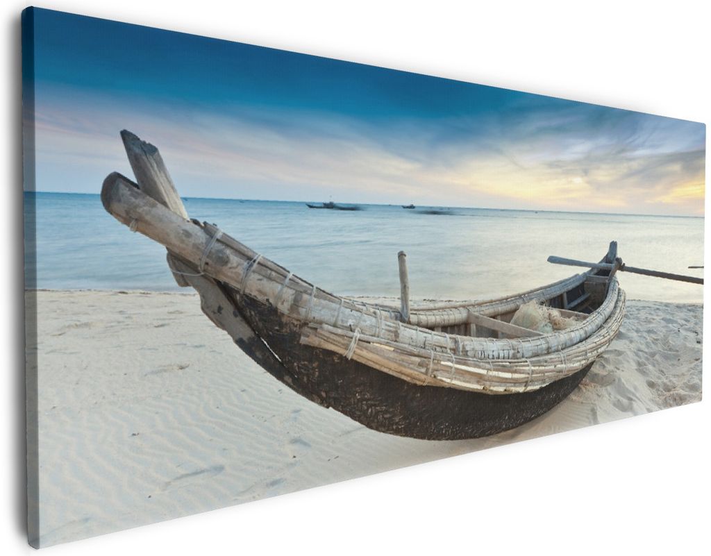 Wallario Premium Leinwandbild Fischerboot am Strand mit Sonnenuntergang in Größe 50 x 125 cm