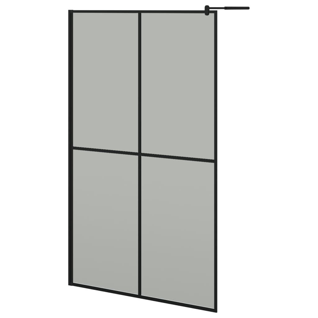 A shower wall panel with a black frame and frosted glass.